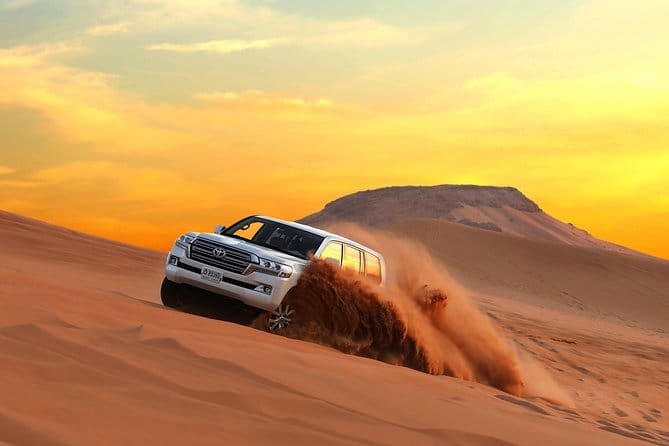 Exclusive desert safari deal Dubai with dune bashing at sunset