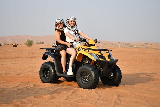 Quad bike riding across the desert